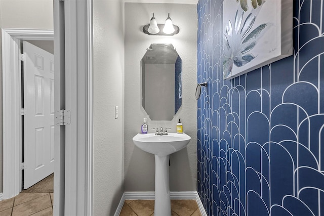 bathroom with tile patterned flooring