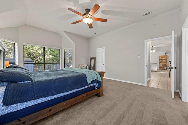 carpeted bedroom with lofted ceiling and ceiling fan