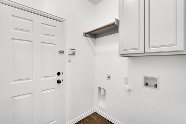 laundry area with hookup for a gas dryer, hookup for a washing machine, hookup for an electric dryer, cabinets, and dark hardwood / wood-style flooring