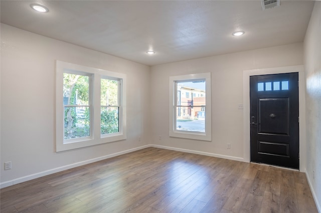 entryway with light hardwood / wood-style floors