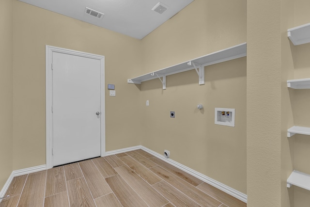 laundry room featuring hookup for a gas dryer, electric dryer hookup, and washer hookup