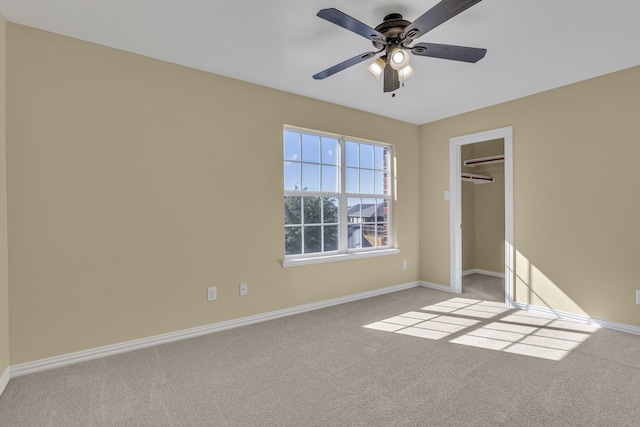 unfurnished bedroom with light carpet, a closet, and ceiling fan