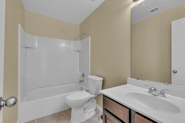 full bathroom featuring vanity, toilet, and washtub / shower combination