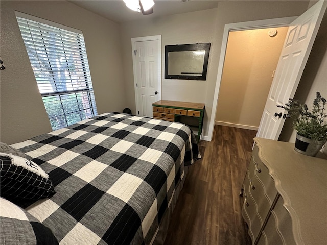 bedroom featuring dark hardwood / wood-style floors