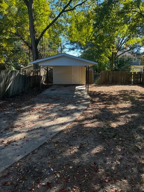 exterior space featuring a carport