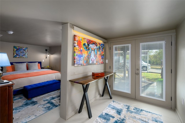 tiled bedroom featuring french doors and access to outside