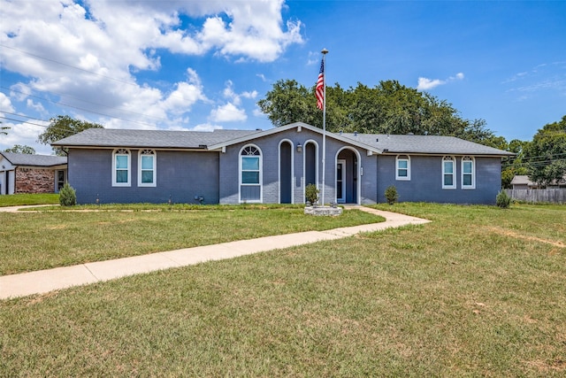 single story home with a front yard