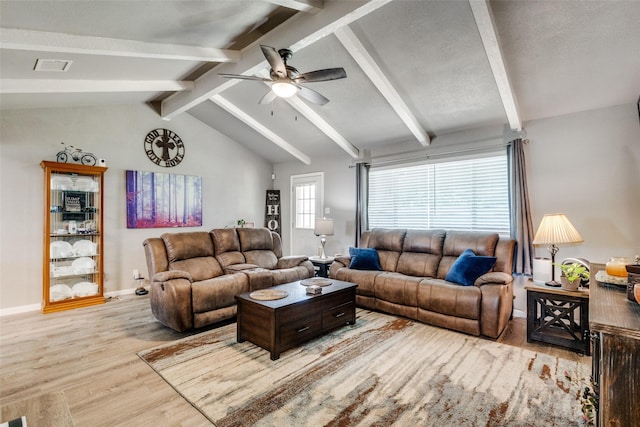 living room with vaulted ceiling with beams, light hardwood / wood-style flooring, and ceiling fan