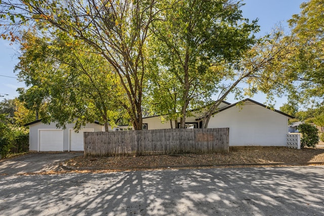 view of property exterior with a garage