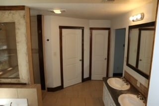 bathroom with vanity and tile patterned floors