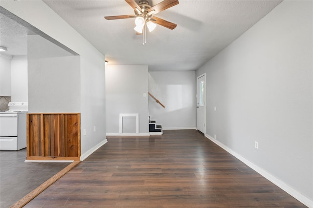 unfurnished living room with a textured ceiling, ceiling fan, and dark hardwood / wood-style flooring