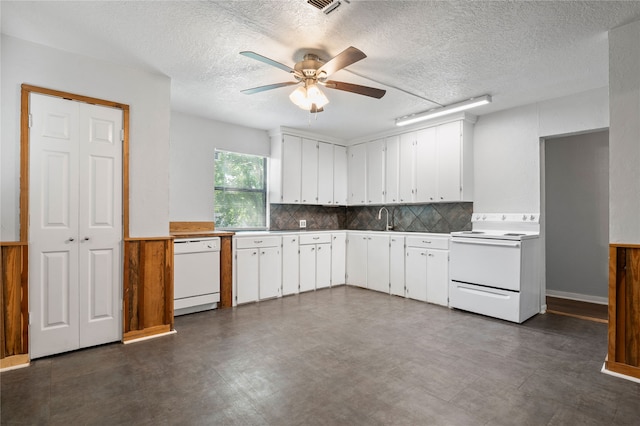 kitchen with decorative backsplash, sink, white cabinetry, white appliances, and ceiling fan