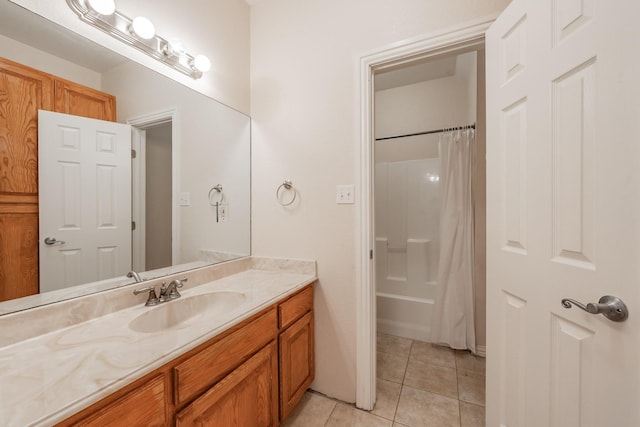 bathroom featuring vanity, tile patterned floors, and shower / bath combo with shower curtain