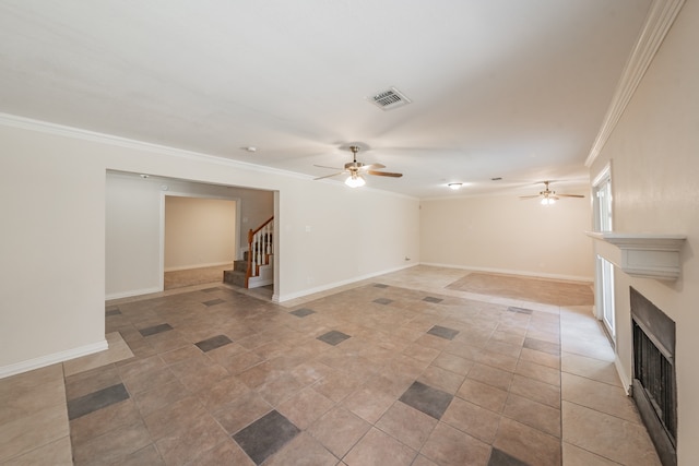 unfurnished living room featuring ornamental molding and ceiling fan