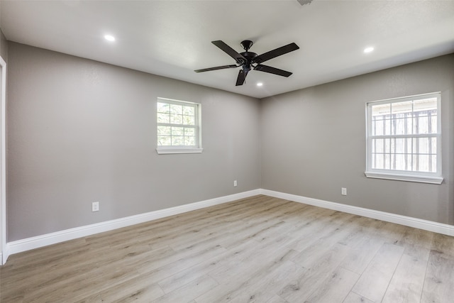 unfurnished room featuring light wood-type flooring and ceiling fan