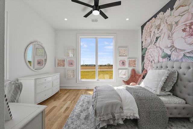 bedroom featuring recessed lighting, a ceiling fan, visible vents, and light wood-type flooring