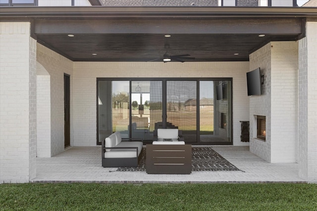 view of patio / terrace with ceiling fan and outdoor lounge area