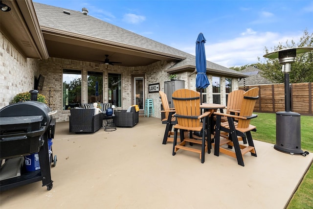 view of patio featuring ceiling fan and an outdoor living space