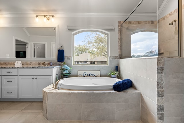 bathroom with shower with separate bathtub, vaulted ceiling, tile patterned floors, vanity, and crown molding