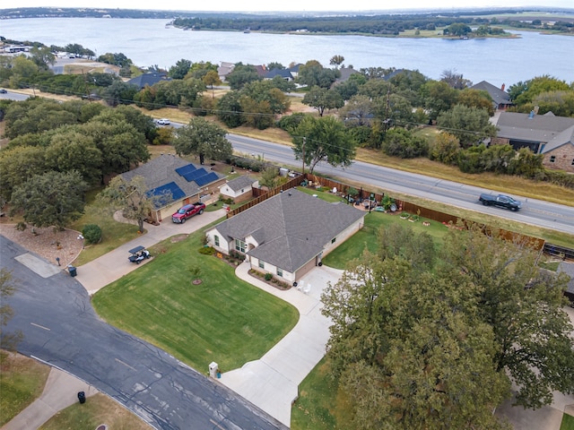 drone / aerial view with a water view