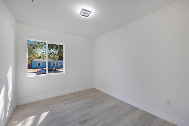 empty room featuring light hardwood / wood-style floors