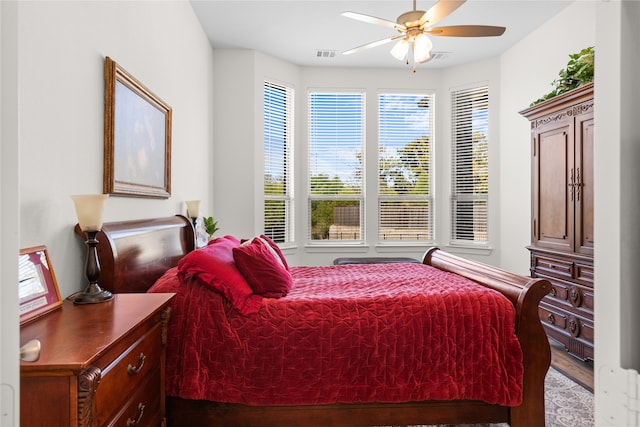 bedroom featuring ceiling fan and hardwood / wood-style flooring