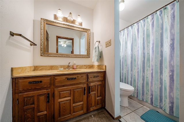 bathroom with vanity, toilet, tile patterned floors, and a shower with curtain