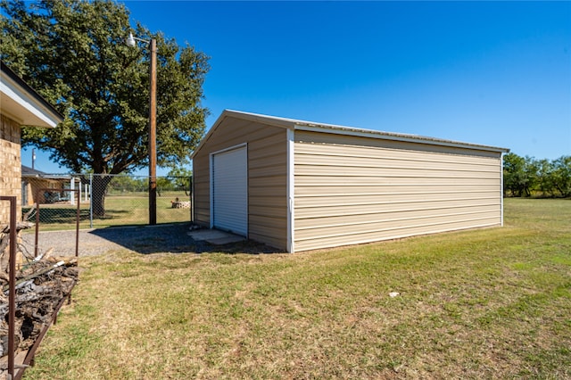 view of outdoor structure with a yard