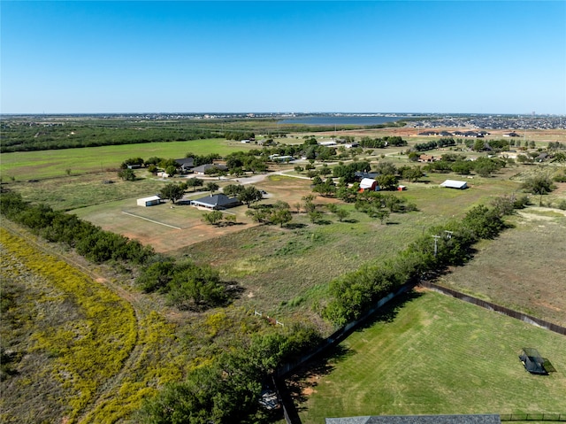 birds eye view of property with a rural view