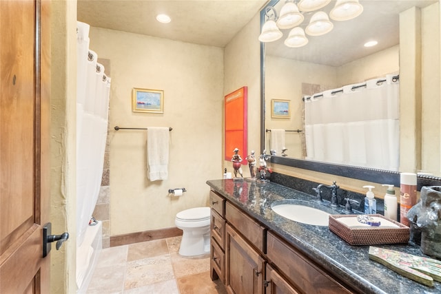 full bathroom with vanity, shower / bath combination with curtain, and toilet