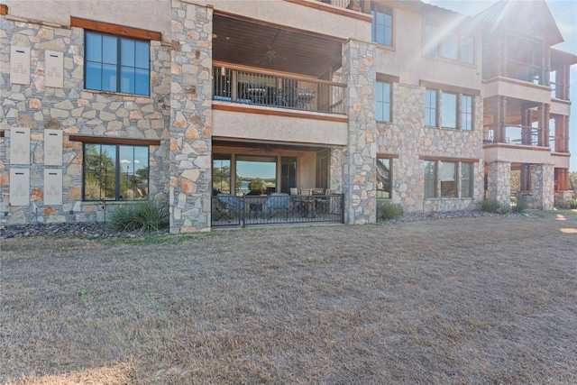 exterior space featuring a patio and a balcony