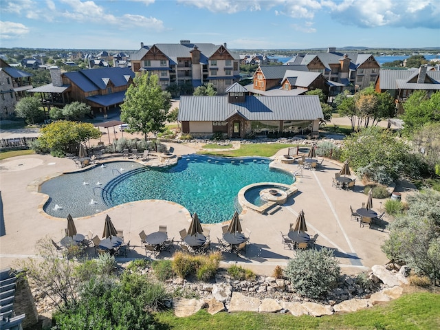 view of pool featuring a patio