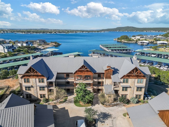 bird's eye view with a water view