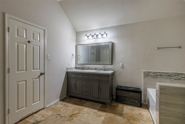 bathroom featuring a bathing tub and vanity