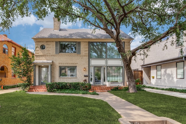 view of front facade with a front lawn