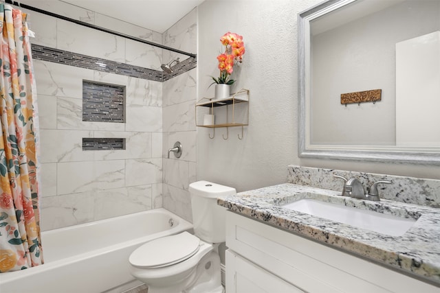 full bathroom with vanity, toilet, and shower / tub combo with curtain