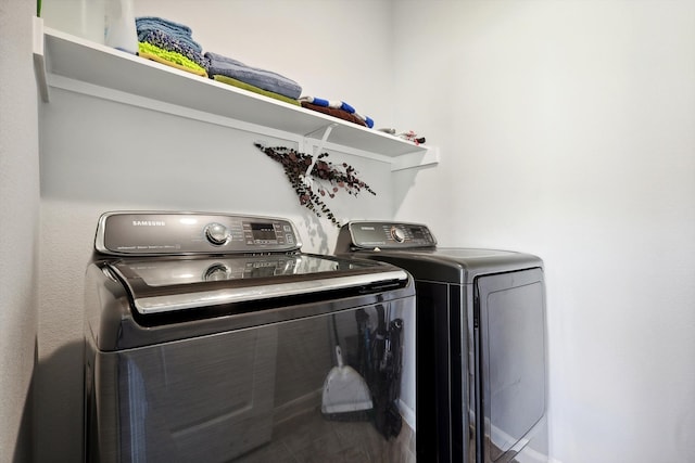 laundry area with washing machine and dryer