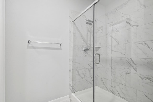 bathroom with an enclosed shower