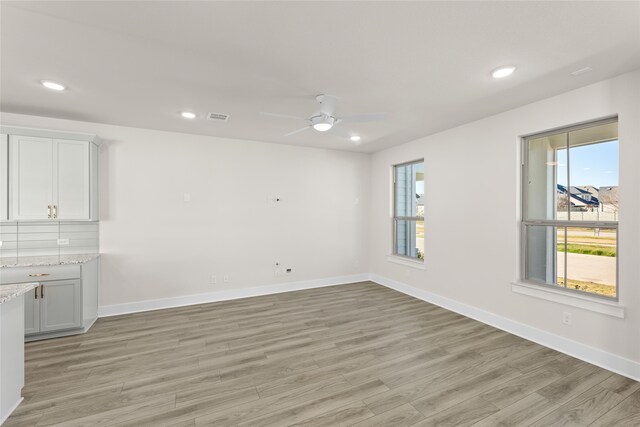 carpeted living room featuring vaulted ceiling