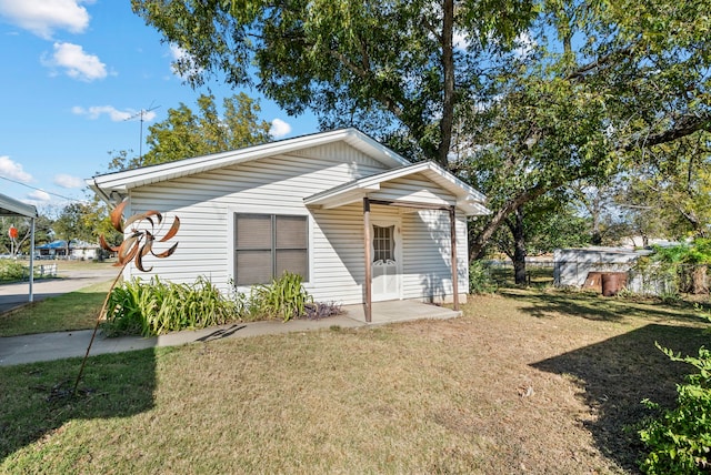 bungalow with a front yard