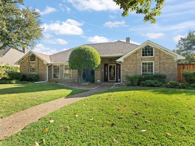 ranch-style house with a front lawn