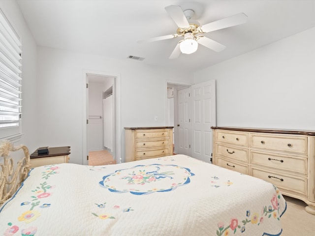 bedroom featuring a closet and ceiling fan