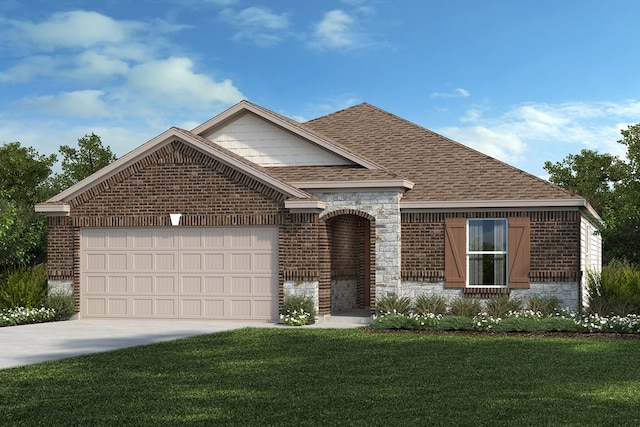 view of front of home featuring a front yard and a garage