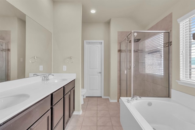 full bathroom featuring toilet, vanity, tile patterned floors, and plus walk in shower