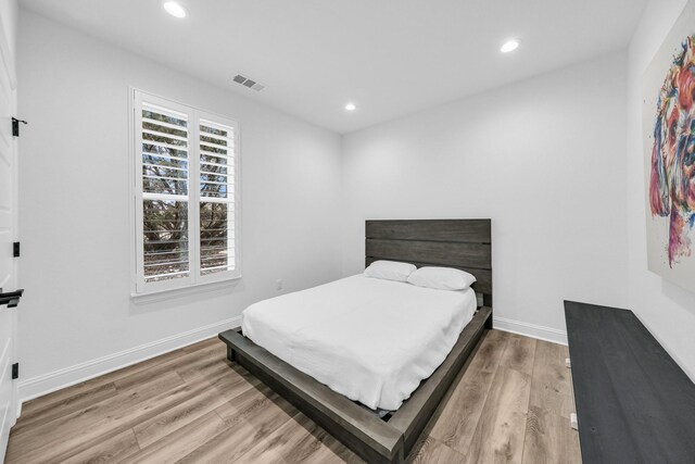 bedroom featuring light hardwood / wood-style flooring