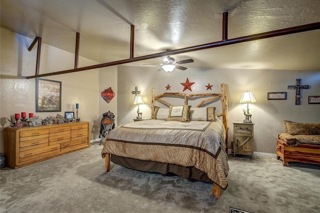 bedroom featuring carpet floors, vaulted ceiling, and ceiling fan