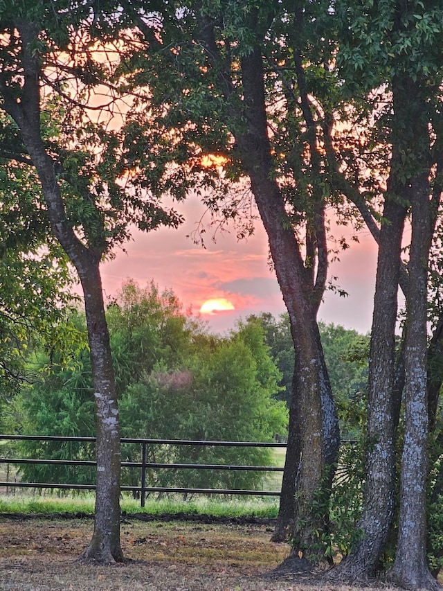 view of gate at dusk