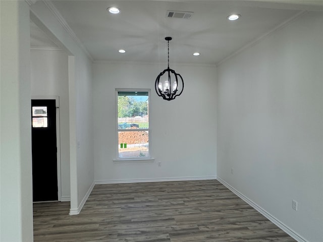 unfurnished dining area featuring a notable chandelier, ornamental molding, and dark hardwood / wood-style flooring