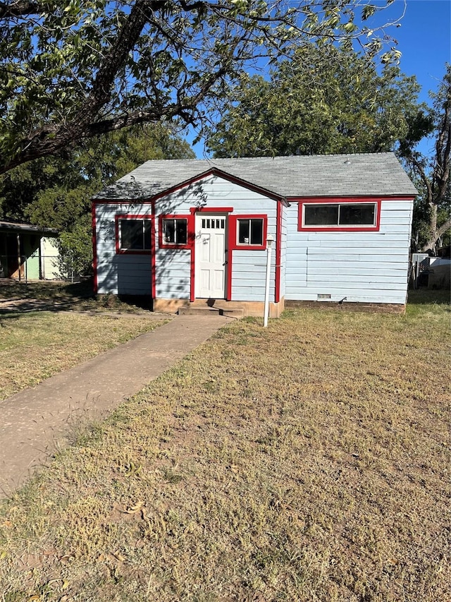 exterior space with a lawn