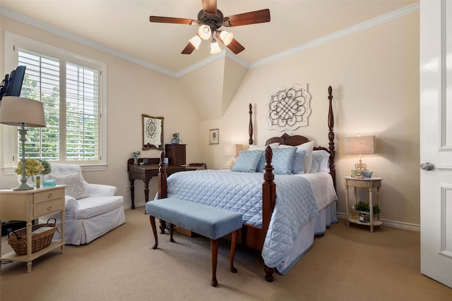 carpeted bedroom with ornamental molding, vaulted ceiling, and ceiling fan